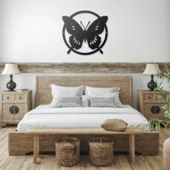 Black minimalist circled butterfly metal art showcase in bedroom