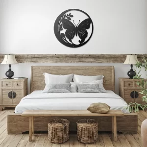 Black circled butterfly and foliage metal art showcase in bedroom