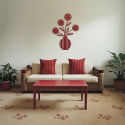 Red metal flower vase artwork display in living room