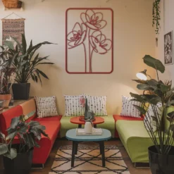 Red single-line art display in a room with red color scheme
