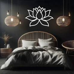 White lotus metal wall art hanging in a dark bedroom