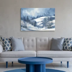 24 by 36 in winter landscape art in white and blue themed living room