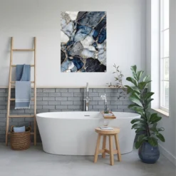 Bright colored bathroom with blue grey gold marble wall decor