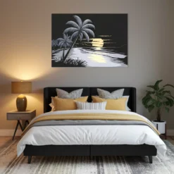 A black, white and yellow themed bedroom with beach sunset metallic artwork