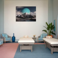 Spa massage room featuring celestial landscape artwork