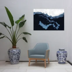 Blue themed lounge decor with topographic map wall design
