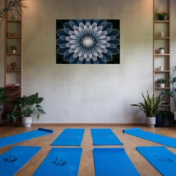 Blue white yoga room with minimal floral wall hanging