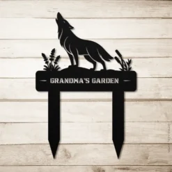 Black custom metallic wolf yard sign with name
