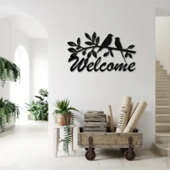 Black steel birds branch welcome sign indoor