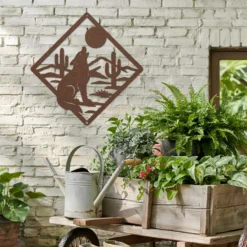 Brown powder-coated steel desert coyote exterior wall art