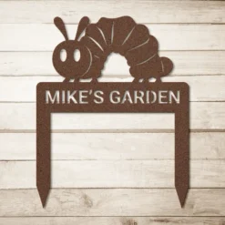 Brown weatherproof metal caterpillar yard art personalized name