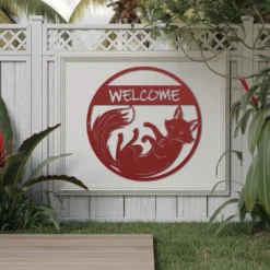 Red metallic fox welcome sign outside