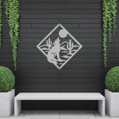 Silver colored metallic desert coyote howl patio decor