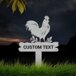 Silver colored personalized metal rooster yard sign