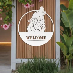 White metallic wolf welcome sign outdoor