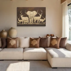 Gold and brown wildlife canvas art big modern living room neutral color scheme