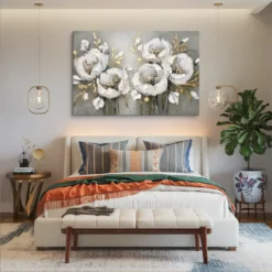 Luxe White Gold Gray Bloom: Soft botanical canvas print centred above a white headboard in a styled bedroom
