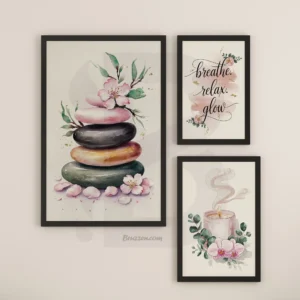 Three-piece spa zen wall art set with stones, breathe relax glow quote and candle adorned with pink blooms and green plants