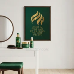 A chic beauty studio vanity space styled with an emerald green and gold framed canvas print as a focal point.