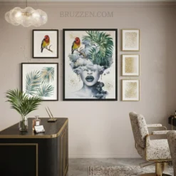 A curated gallery wall featuring the botanical woman print alongside gold accents and tropical indoor plants