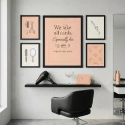 Funny salon payment quote framed poster styled among matching blush pink beauty art on a glam room gallery wall
