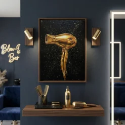 Black and gold hair dryer framed canvas wall art displayed in a modern blow-dry bar interior