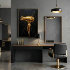 Black and gold hair dryer framed canvas wall art displayed in a modern luxurious salon interior.