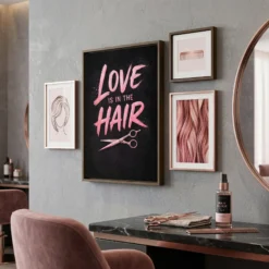 Pink brush lettering hair salon canvas styled on a modern gallery wall with professional decor