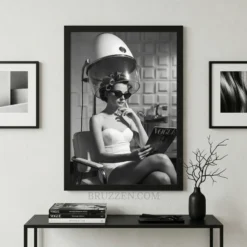 Editorial fashion poster displayed in a modern hair salon setting with professional styling equipment