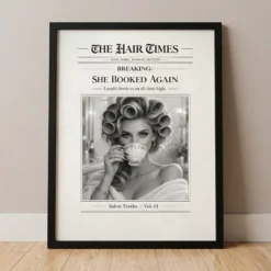 Funny newspaper style framed poster of a salon client in rollers sipping tea with She Booked Again headline.