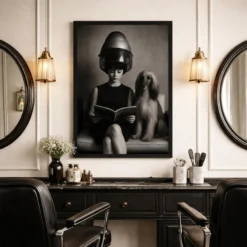 Moody black and white vintage hair salon framed print displayed above a cabinets in a sophisticated beauty room