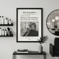 Minimalist hair salon interior featuring a vintage newspaper framed poster hanging above a professional styling station.