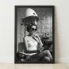 Black and white framed poster of a woman in rollers under a vintage hood dryer in a retro salon