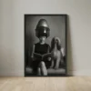 Black and white framed poster of a woman and an Afghan hound sitting under a vintage salon hair dryer.