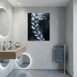 French braid silver hair glossy metal print displayed in hair salon reception area