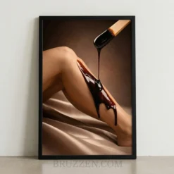 dark wax application editorial framed poster showing chocolate wax on leg with satin drape