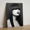 black hair fringe portrait glossy metal print with crimson lip on dark charcoal background