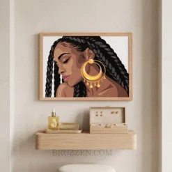Large Afrocentric framed canvas print hanging in hair salon waiting area