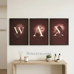 Three-panel WAX letter art hung on a plain white wall